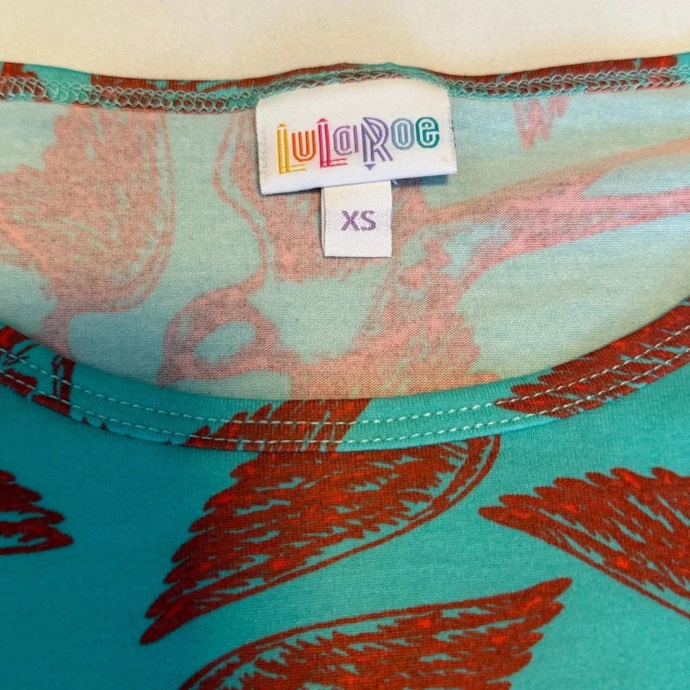 LuLaRoe Irma Teal and Red Patterned Top
